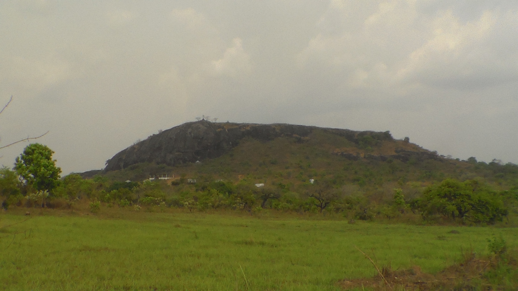 Travel Guide. The Bassa believe the Ngok Lituba Hill (pictured) traveled in front of them from Egypt to Cameroon (Photo by Serge Etele)