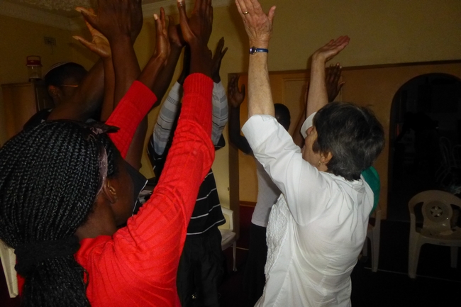 Altogether now. Mickey teaches Israeli dancing to enthusiastic students (Photo courtesy of Mickey Feinberg)